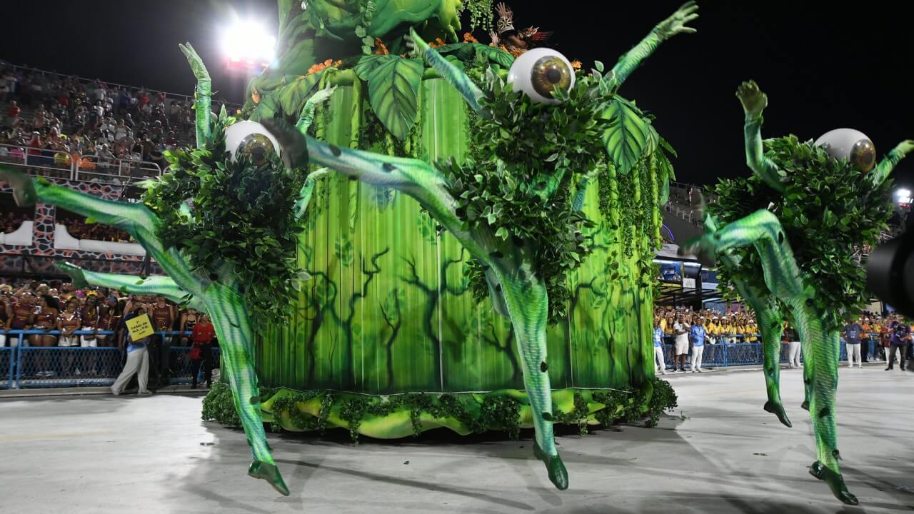 people parading in a samba school costume - Rio Carnival