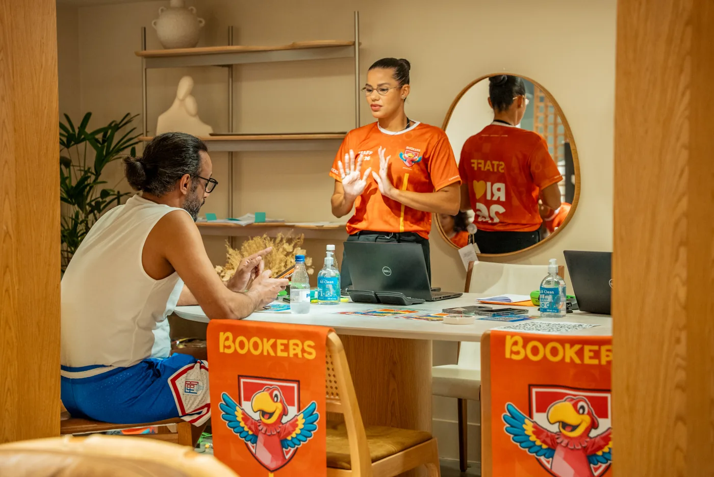 Bookers specialist assisting a guest at the Hospitality Desk in Copacabana