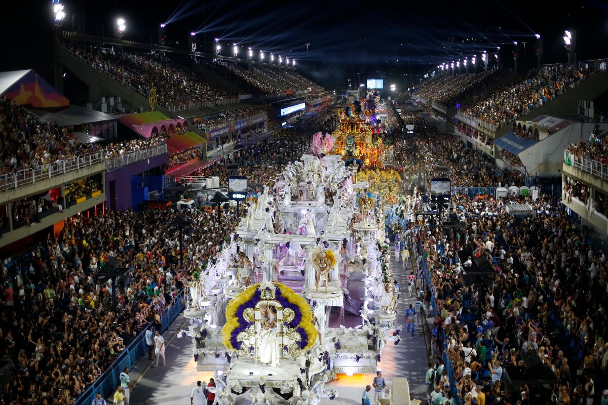 Rio carnival is BACK! Brazil's famous dancers look as flamboyant as ever as  parade returns