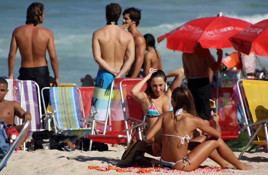 People having fun in Leblon beach People having fun in Leblon beach