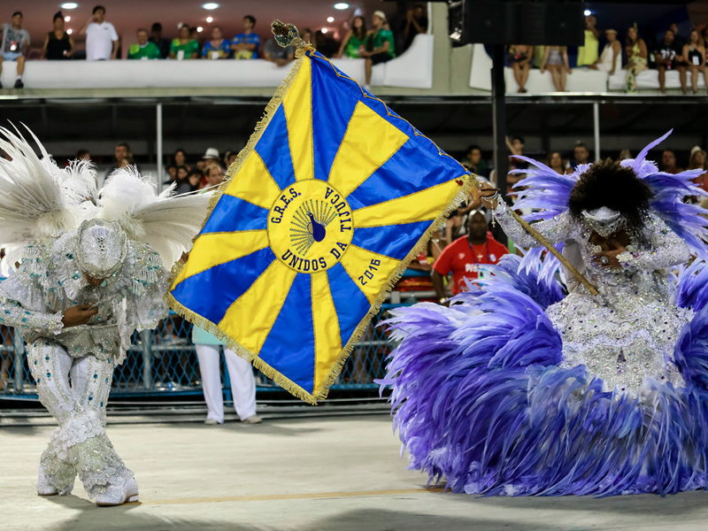 Mestre Sala and Porta Bandeira - Rio carnival parade in Brazil Mestre Sala and Porta Bandeira - Rio carnival parade in Brazil
